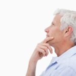 Side view of a man thinking