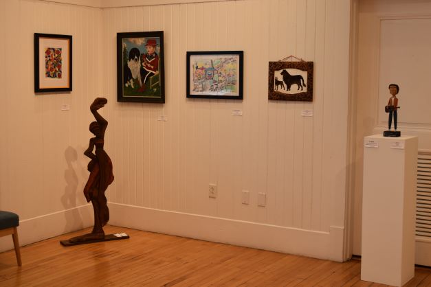 Image: Various two-dimensional and three-dimensional works on display as part of the exhibition Folk Yeah!, one of three intersecting shows within Appalachia from the Inside: Celebrating Kentucky’s Appalachian Art and Culture. Photo by Kim Kobersmith.