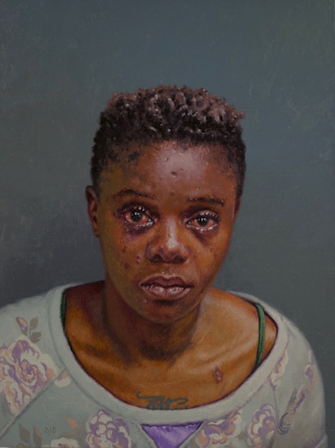 Image: Dick Dougherty, Arrested: S-051N16/319, 2019, oil on linen covered panels, 9” x 12”. A painting of a portrait of a woman looking directly at the camera for a mug shot. She is wearing a blue shirt with flowers on it and her eyes are red from crying. Photo provided by the artist.