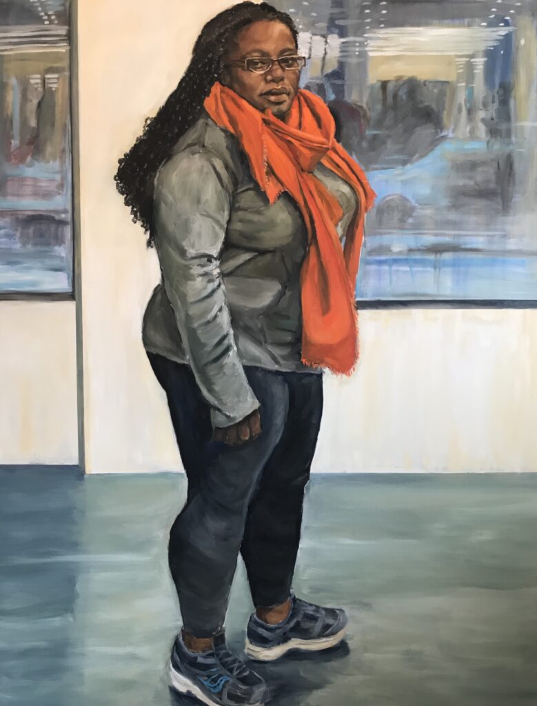 Image: Sandra Charles, Reflections of Us (2017), oil on canvas, 2018,  48 x 60". A painting of a Black woman with glasses looking straight at the viewer. She is wearing a grey sweatshirt, leggings, and a bright orange scarf. Image courtesy of the artist.