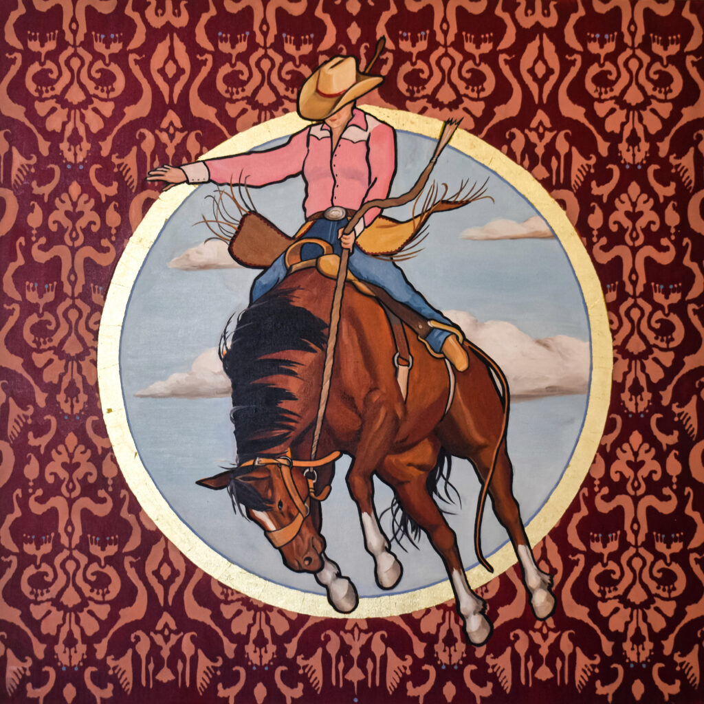 Image: Honora Jacob, Buckaroo Jane : Rodeo Queen, 2022, oil and gold leaf on canvas, 36” x 36”. A painting depicting Buckaroo Jane, a.k.a. Jane Revercomb, a female bronco rider and 2016 Miss Rodeo Virginia. She is wearing a pink western-style shirt and a cowgirl hat while riding a brown horse. She has one hand in the air and she and the horse appear to be in mid air. Behind her and the horse is a circle of sky with a golden ring around it. The background shows a dark red and light red pattern. Image courtesy of the artist. 
