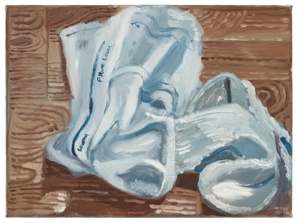 Image: Aaron Michael Skolnick. After working on the trail, 2022. Oil on canvas, 9” x 12”. Photo provided by MARCH gallery. A painting of a white pair underwear laying crumpled on a wood floor.