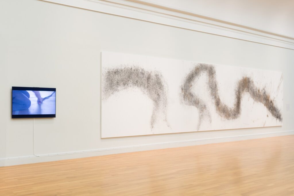 Image: Cai Guo-Qiang, Cuyahoga River Lightning, 2018. Documentary video (left) and gunpowder on canvas (right). Photo by Charlie Edwards.